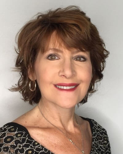 Layered short haircut over 60