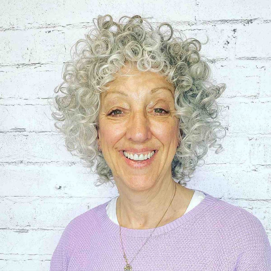 neck-length-cut-with-defined-curls-for-women-over-60