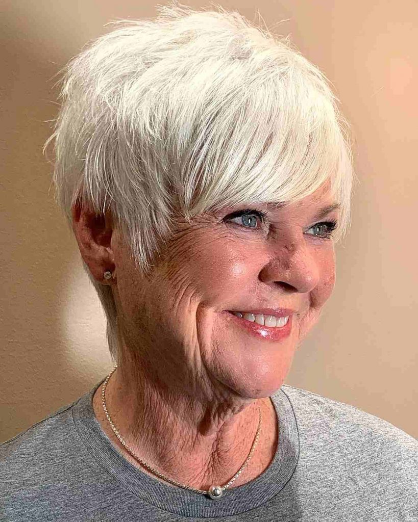 white-blonde-pixie-with-long-bangs-for-women-over-60-with-thin-hair